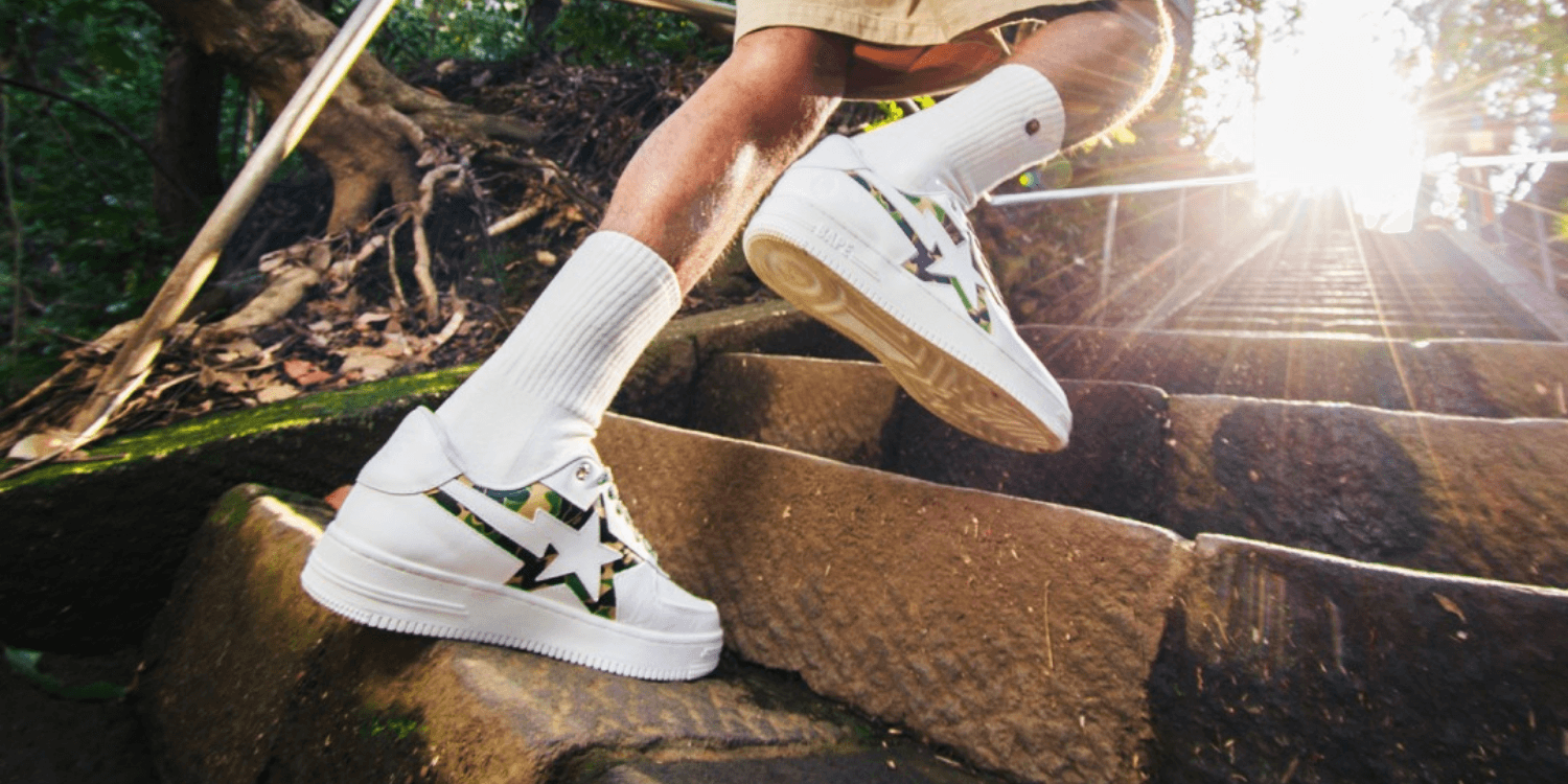 white BAPE sneakers on feet